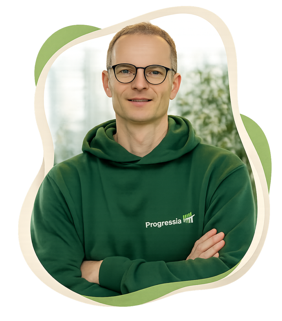 Teamarbeit bei Progressia im Büro – Mitarbeiter im Arbeitsalltag